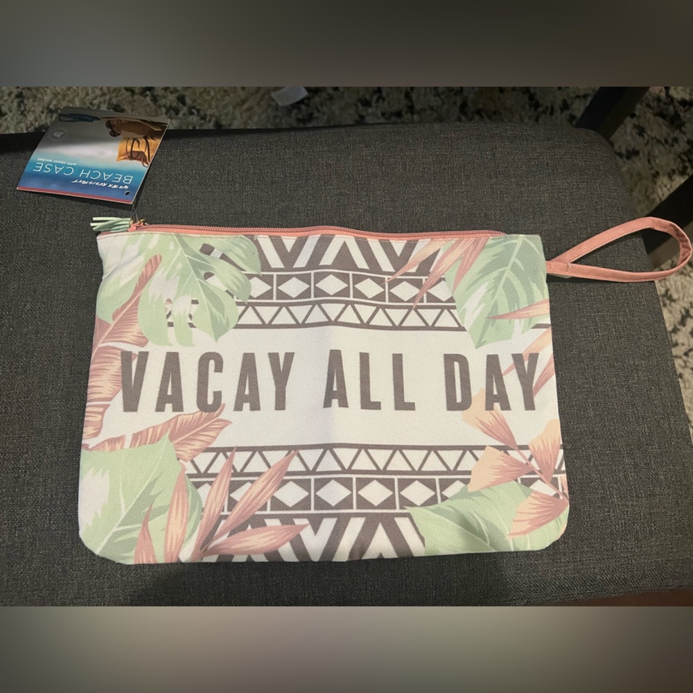 Water resistant beach case with zipper pocket!